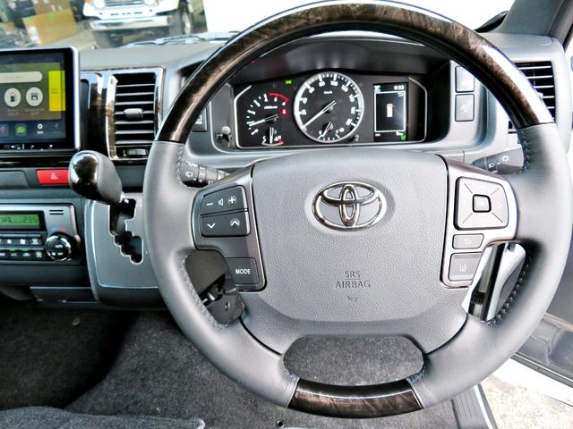 ハイエースバン スーパーGL ダークプライムII 新車未登録/7型/6AT/2800ccディーゼルターボ/415コブラフルエアロ/18インチAW/両側出しマフラーカッター/ワイパーカウル/ルーフスポイラー/イエローキャリパーカバー/フルセグTV/(66枚目)