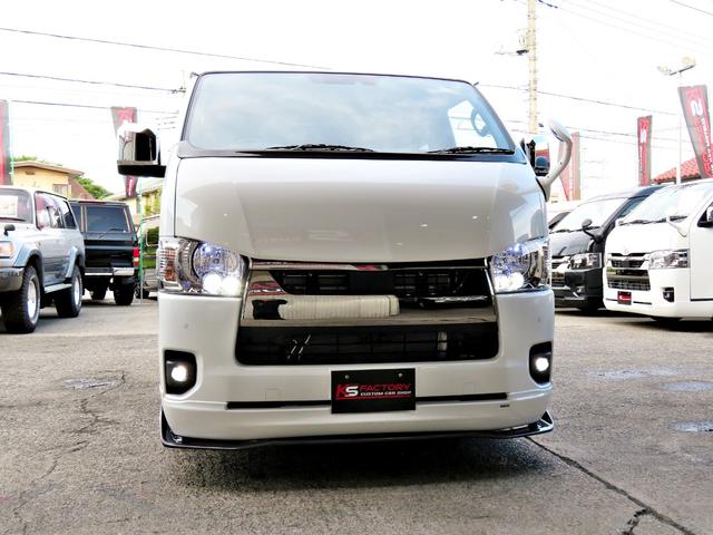 ハイエースバン スーパーGL ダークプライムII 新車未登録/7型/6AT/2800ccディーゼルターボ/415コブラフルエアロ/18インチAW/両側出しマフラーカッター/ワイパーカウル/ルーフスポイラー/イエローキャリパーカバー/フルセグTV/(76枚目)