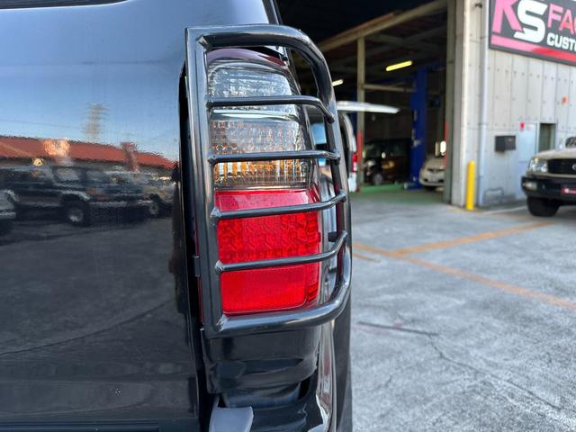 ハイラックスサーフ ＳＳＲ－Ｘ　Ｖセレクション　１８５サーフ　ブラック全塗装済み　クリスタルヘッドライト　ＴＯＹＯＴＡ文字メッシュグリル　グリルガード　ＭＧ　Ｂｅａｓｔホイール　マキシスタイヤ　ガナドールマフラー　新品ブラック＆千鳥柄シートカバー（60枚目）