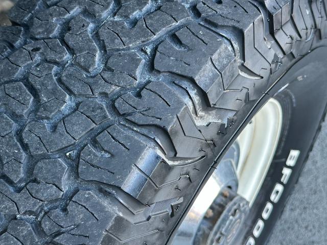 ランドクルーザープラド EXワイド ナローボディ仕様 ベージュホワイトツートン全塗装済み 新品グリル 新品ウインカーレンズ 新品3色LEDコンビテール シートカバー ナルディハンドル ナビ Bカメラ フルセグTV 輸出用ホイール(58枚目)