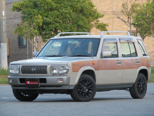 ラシーン ｆｔ　タイプＳ　下取り車　４ＷＤ　木目調パネル　ナルディハンドル　レザー調シートカバー　キーレス　１ＤＩＮオーディオ　ＥＴＣ　電動格納ミラー　タイミングチェーン　社外ホイール　背面タイヤ（2枚目）