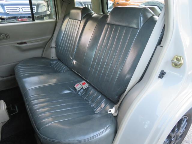 ラシーン ｆｔ　タイプＳ　下取り車　４ＷＤ　木目調パネル　ナルディハンドル　レザー調シートカバー　キーレス　１ＤＩＮオーディオ　ＥＴＣ　電動格納ミラー　タイミングチェーン　社外ホイール　背面タイヤ（11枚目）