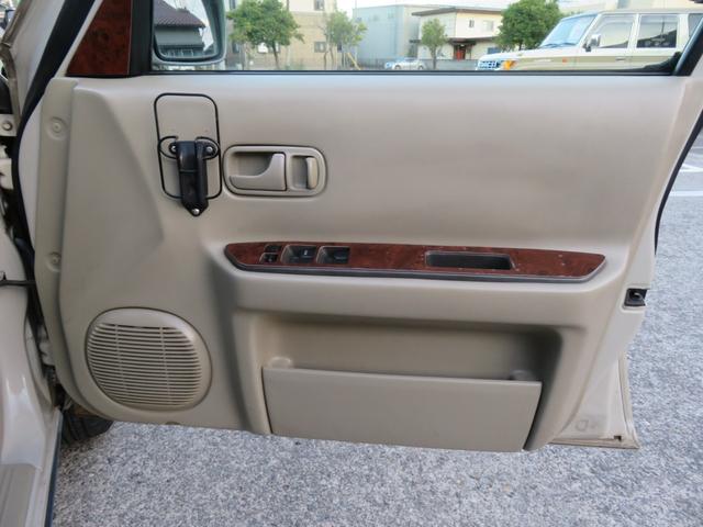 ラシーン ｆｔ　タイプＳ　下取り車　４ＷＤ　木目調パネル　ナルディハンドル　レザー調シートカバー　キーレス　１ＤＩＮオーディオ　ＥＴＣ　電動格納ミラー　タイミングチェーン　社外ホイール　背面タイヤ（12枚目）