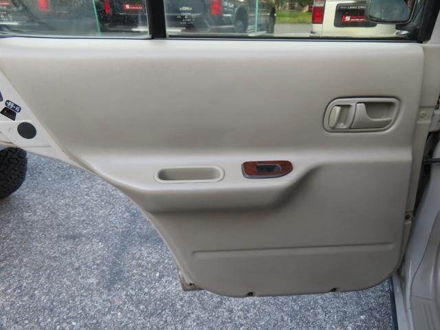 ラシーン ｆｔ　タイプＳ　下取り車　４ＷＤ　木目調パネル　ナルディハンドル　レザー調シートカバー　キーレス　１ＤＩＮオーディオ　ＥＴＣ　電動格納ミラー　タイミングチェーン　社外ホイール　背面タイヤ（15枚目）