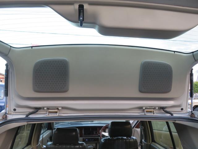 ラシーン ｆｔ　タイプＳ　下取り車　４ＷＤ　木目調パネル　ナルディハンドル　レザー調シートカバー　キーレス　１ＤＩＮオーディオ　ＥＴＣ　電動格納ミラー　タイミングチェーン　社外ホイール　背面タイヤ（20枚目）