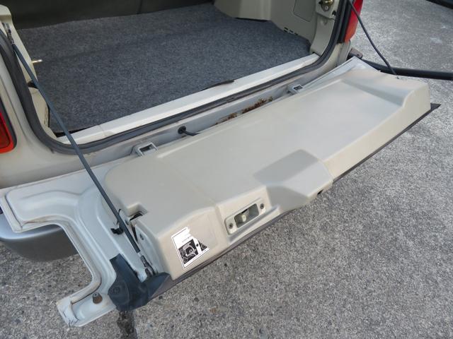 ラシーン ｆｔ　タイプＳ　下取り車　４ＷＤ　木目調パネル　ナルディハンドル　レザー調シートカバー　キーレス　１ＤＩＮオーディオ　ＥＴＣ　電動格納ミラー　タイミングチェーン　社外ホイール　背面タイヤ（21枚目）