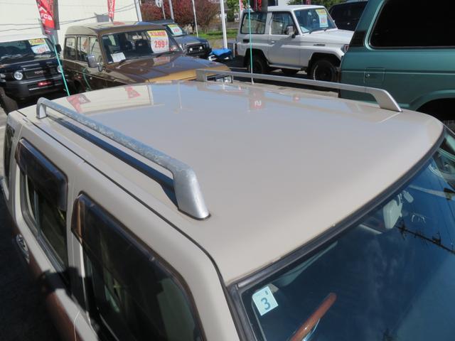 ラシーン ｆｔ　タイプＳ　下取り車　４ＷＤ　木目調パネル　ナルディハンドル　レザー調シートカバー　キーレス　１ＤＩＮオーディオ　ＥＴＣ　電動格納ミラー　タイミングチェーン　社外ホイール　背面タイヤ（32枚目）