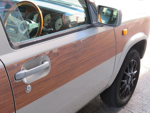 ラシーン ｆｔ　タイプＳ　下取り車　４ＷＤ　木目調パネル　ナルディハンドル　レザー調シートカバー　キーレス　１ＤＩＮオーディオ　ＥＴＣ　電動格納ミラー　タイミングチェーン　社外ホイール　背面タイヤ（35枚目）