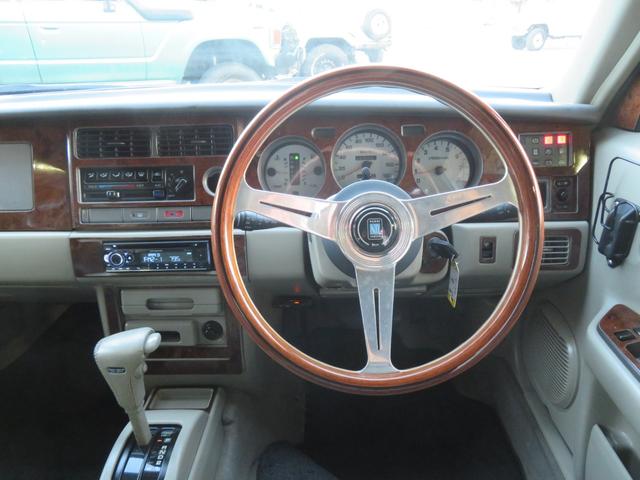 ラシーン ｆｔ　タイプＳ　下取り車　４ＷＤ　木目調パネル　ナルディハンドル　レザー調シートカバー　キーレス　１ＤＩＮオーディオ　ＥＴＣ　電動格納ミラー　タイミングチェーン　社外ホイール　背面タイヤ（38枚目）