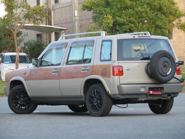 ラシーン ｆｔ　タイプＳ　下取り車　４ＷＤ　木目調パネル　ナルディハンドル　レザー調シートカバー　キーレス　１ＤＩＮオーディオ　ＥＴＣ　電動格納ミラー　タイミングチェーン　社外ホイール　背面タイヤ（64枚目）