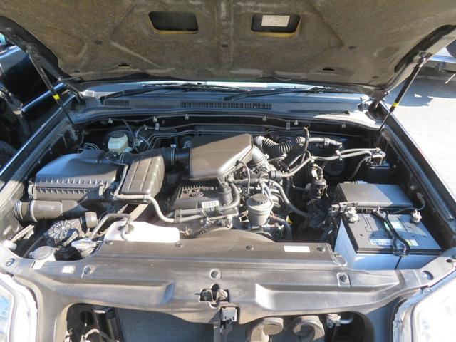 ハイラックスサーフ ＳＳＲ－Ｘリミテッド　２１５サーフ　後期型　ルーフレール　２インチリフトアップ　社外ＡＷ　ジオランダーＸーＡＴタイヤ　黒木目レザーコンビハンドル　ウッドコンビシフトノブ　ナビＢカメラ　フルセグＴＶ　寒冷地仕様　バックフォグ（5枚目）