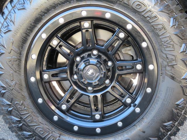 ハイラックスサーフ ＳＳＲ－Ｘリミテッド　２１５サーフ　後期型　ルーフレール　２インチリフトアップ　社外ＡＷ　ジオランダーＸーＡＴタイヤ　黒木目レザーコンビハンドル　ウッドコンビシフトノブ　ナビＢカメラ　フルセグＴＶ　寒冷地仕様　バックフォグ（35枚目）