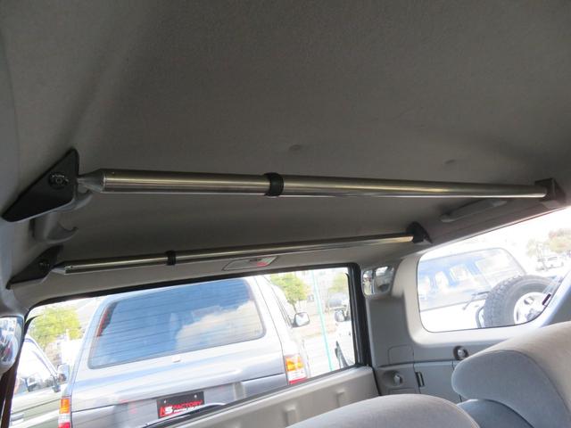 ハイラックスサーフ ＳＳＲ－Ｘリミテッド　２１５サーフ　後期型　ルーフレール　２インチリフトアップ　社外ＡＷ　ジオランダーＸーＡＴタイヤ　黒木目レザーコンビハンドル　ウッドコンビシフトノブ　ナビＢカメラ　フルセグＴＶ　寒冷地仕様　バックフォグ（55枚目）