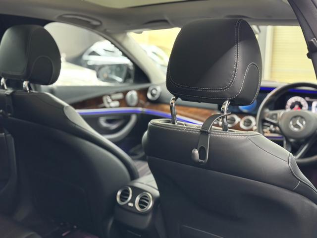 Eクラス E400 4マチック エクスクルーシブ パノラミックスライディングルーフ 黒革シート アクティブクルーズコントロール 純正ナビ フルセグTV ブルメスター パワーテールゲート 前後ドラレコ 360°ビューカメラ アンビエントライト(21枚目)