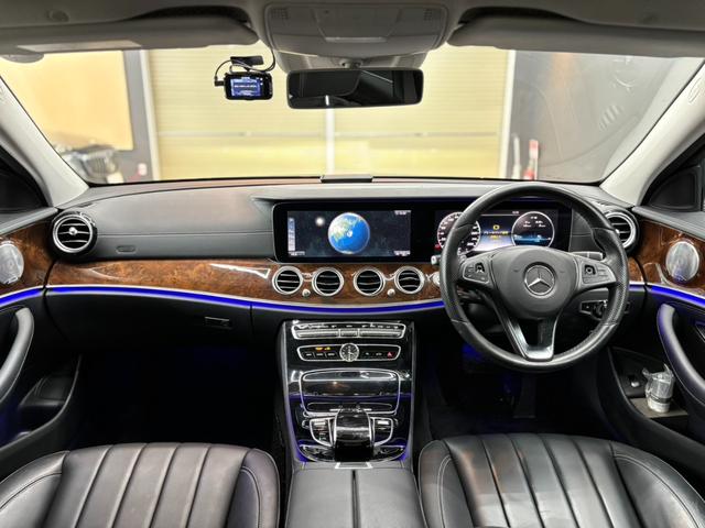 Eクラス E400 4マチック エクスクルーシブ パノラミックスライディングルーフ 黒革シート アクティブクルーズコントロール 純正ナビ フルセグTV ブルメスター パワーテールゲート 前後ドラレコ 360°ビューカメラ アンビエントライト(27枚目)