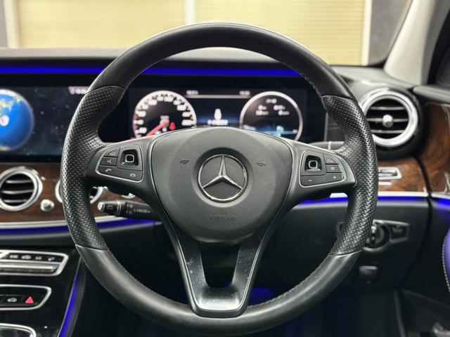 Eクラス E400 4マチック エクスクルーシブ パノラミックスライディングルーフ 黒革シート アクティブクルーズコントロール 純正ナビ フルセグTV ブルメスター パワーテールゲート 前後ドラレコ 360°ビューカメラ アンビエントライト(28枚目)