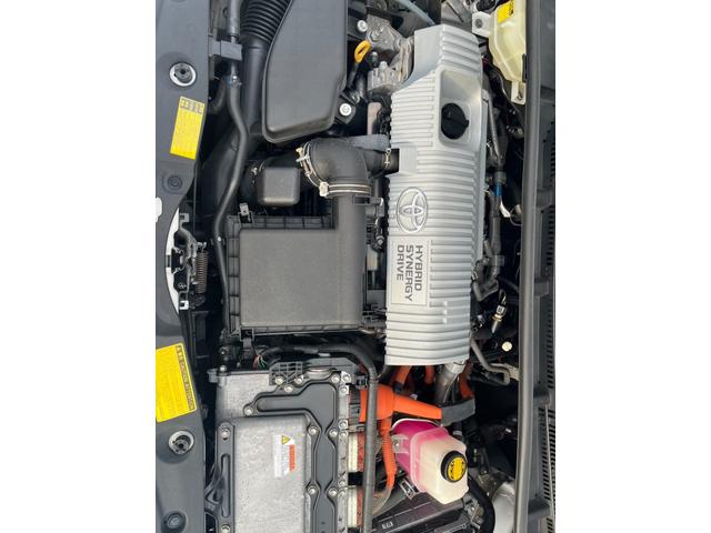 プリウス Ｌ　ＥＴＣ　ＴＶ　アルミホイール　ＣＶＴ　スマートキー　電動格納ミラー　盗難防止システム　ミュージックプレイヤー接続可　衝突安全ボディ　ＡＢＳ　ＥＳＣ　エアコン　パワーステアリング　パワーウィンドウ（21枚目）