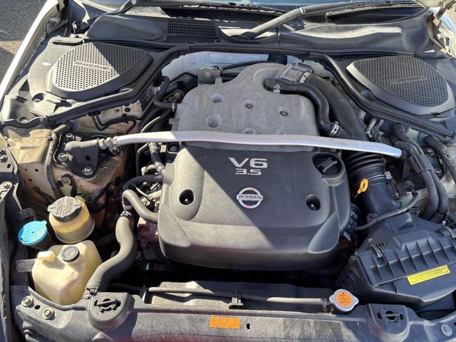 フェアレディZ バージョンT AT HID キーレスエントリー 電動格納ミラー シートヒーター アルミホイール 盗難防止システム 衝突安全ボディ ABS ESC CD DVD再生 カセット エアコン パワーステアリング(27枚目)