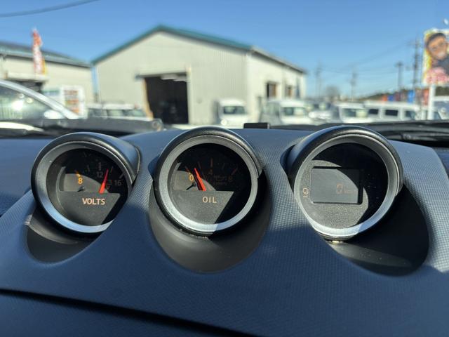 フェアレディZ バージョンT AT HID キーレスエントリー 電動格納ミラー シートヒーター アルミホイール 盗難防止システム 衝突安全ボディ ABS ESC CD DVD再生 カセット エアコン パワーステアリング(37枚目)