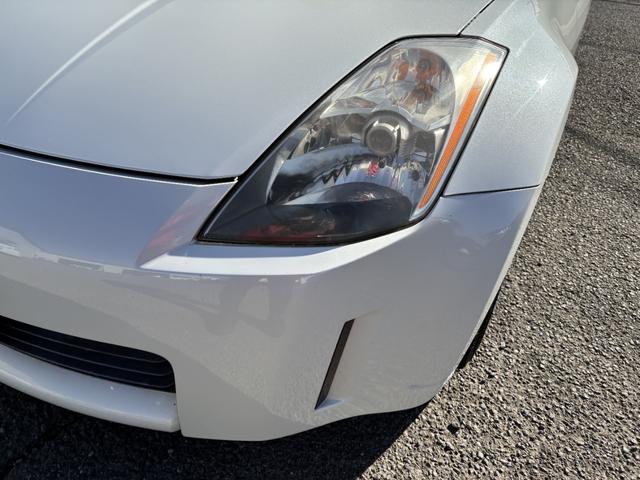 フェアレディZ バージョンT AT HID キーレスエントリー 電動格納ミラー シートヒーター アルミホイール 盗難防止システム 衝突安全ボディ ABS ESC CD DVD再生 カセット エアコン パワーステアリング(41枚目)