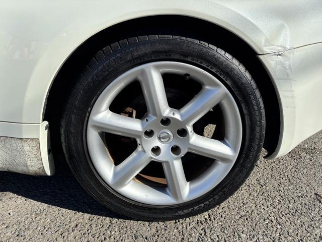 フェアレディZ バージョンT AT HID キーレスエントリー 電動格納ミラー シートヒーター アルミホイール 盗難防止システム 衝突安全ボディ ABS ESC CD DVD再生 カセット エアコン パワーステアリング(45枚目)