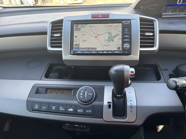 フリードハイブリッド ジャストセレクション　ＥＴＣ　バックカメラ　ナビ　ＴＶ　オートクルーズコントロール　両側電動スライドドア　オートライト　ＨＩＤ　スマートキー　アイドリングストップ　電動格納ミラー　３列シート　ウォークスルー　ＣＶＴ（49枚目）