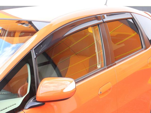 フィット RS 6速MT・Bluetooth接続・バックカメラ・HIDヘッドライト・WORK17インチアルミ・ローダウン・無限グリル&マフラー・スマートキー・ETC・エアロ・プライバシーガラス・ドアバイザー(18枚目)