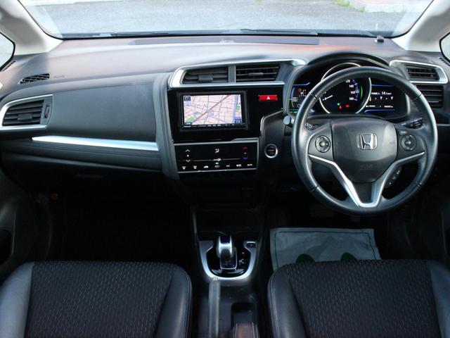 フィットハイブリッド Lパッケージ ワンオーナー・ハーフレザーシート・LEDヘッドライト・バックカメラ・メモリーナビ・フルセグ・USB入力・スマートキー・ETC・クルーズコントロール・オートA/C・ウィンカーミラー(4枚目)