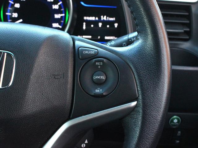 フィットハイブリッド Lパッケージ ワンオーナー・ハーフレザーシート・LEDヘッドライト・バックカメラ・メモリーナビ・フルセグ・USB入力・スマートキー・ETC・クルーズコントロール・オートA/C・ウィンカーミラー(12枚目)