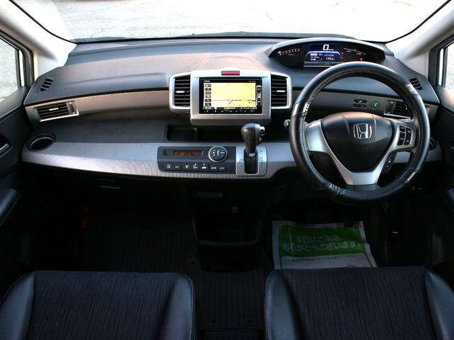 フリードハイブリッド ジャストセレクション　両側パワースライドドア・Ｇａｔｈｅｒｓナビ・ＥＴＣ・地デジ・バックカメラ・クルーズコントロール・ハーフレザーシート・スマートキー・ＨＩＤヘッドライト・純正１５インチＡＷ・ウインカーミラー・オートＡ／Ｃ（5枚目）