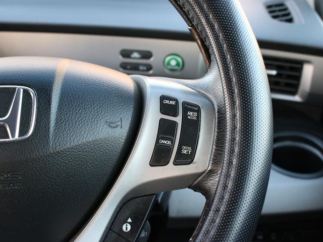 フリードハイブリッド ジャストセレクション　両側パワースライドドア・Ｇａｔｈｅｒｓナビ・ＥＴＣ・地デジ・バックカメラ・クルーズコントロール・ハーフレザーシート・スマートキー・ＨＩＤヘッドライト・純正１５インチＡＷ・ウインカーミラー・オートＡ／Ｃ（18枚目）