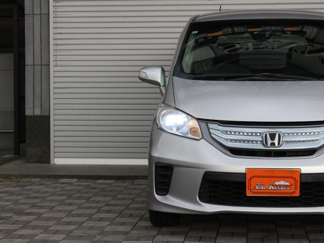 フリードハイブリッド ジャストセレクション　両側パワースライドドア・Ｇａｔｈｅｒｓナビ・ＥＴＣ・地デジ・バックカメラ・クルーズコントロール・ハーフレザーシート・スマートキー・ＨＩＤヘッドライト・純正１５インチＡＷ・ウインカーミラー・オートＡ／Ｃ（20枚目）