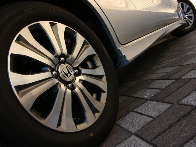 フリードハイブリッド ジャストセレクション　両側パワースライドドア・Ｇａｔｈｅｒｓナビ・ＥＴＣ・地デジ・バックカメラ・クルーズコントロール・ハーフレザーシート・スマートキー・ＨＩＤヘッドライト・純正１５インチＡＷ・ウインカーミラー・オートＡ／Ｃ（23枚目）