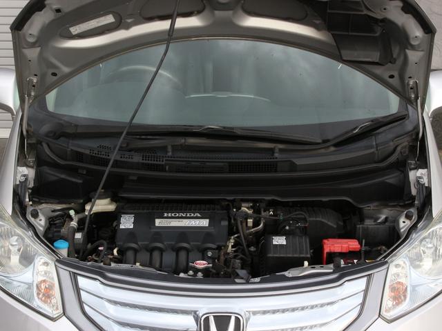 フリードハイブリッド ジャストセレクション　両側パワースライドドア・Ｇａｔｈｅｒｓナビ・ＥＴＣ・地デジ・バックカメラ・クルーズコントロール・ハーフレザーシート・スマートキー・ＨＩＤヘッドライト・純正１５インチＡＷ・ウインカーミラー・オートＡ／Ｃ（26枚目）