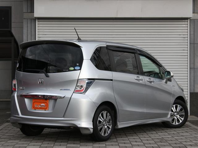 フリードハイブリッド ジャストセレクション　両側パワースライドドア・Ｇａｔｈｅｒｓナビ・ＥＴＣ・地デジ・バックカメラ・クルーズコントロール・ハーフレザーシート・スマートキー・ＨＩＤヘッドライト・純正１５インチＡＷ・ウインカーミラー・オートＡ／Ｃ（29枚目）