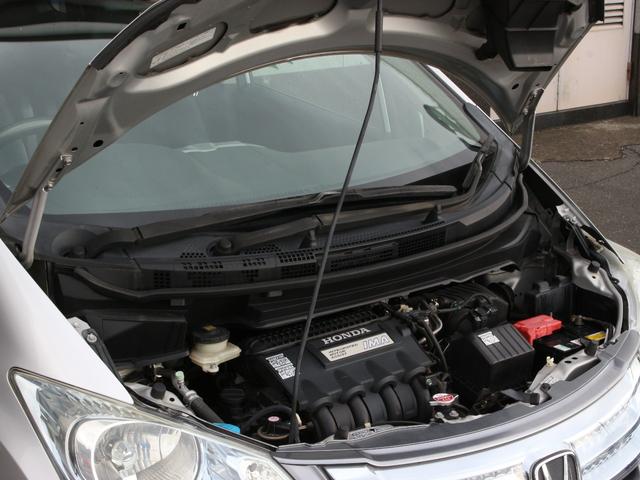 フリードハイブリッド ジャストセレクション　両側パワースライドドア・Ｇａｔｈｅｒｓナビ・ＥＴＣ・地デジ・バックカメラ・クルーズコントロール・ハーフレザーシート・スマートキー・ＨＩＤヘッドライト・純正１５インチＡＷ・ウインカーミラー・オートＡ／Ｃ（31枚目）