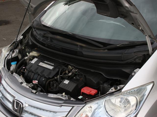 フリードハイブリッド ジャストセレクション　両側パワースライドドア・Ｇａｔｈｅｒｓナビ・ＥＴＣ・地デジ・バックカメラ・クルーズコントロール・ハーフレザーシート・スマートキー・ＨＩＤヘッドライト・純正１５インチＡＷ・ウインカーミラー・オートＡ／Ｃ（33枚目）