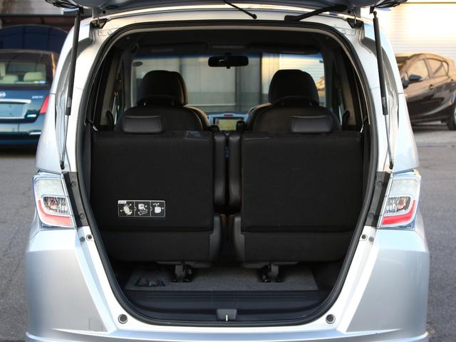 フリードハイブリッド ジャストセレクション　両側パワースライドドア・Ｇａｔｈｅｒｓナビ・ＥＴＣ・地デジ・バックカメラ・クルーズコントロール・ハーフレザーシート・スマートキー・ＨＩＤヘッドライト・純正１５インチＡＷ・ウインカーミラー・オートＡ／Ｃ（35枚目）