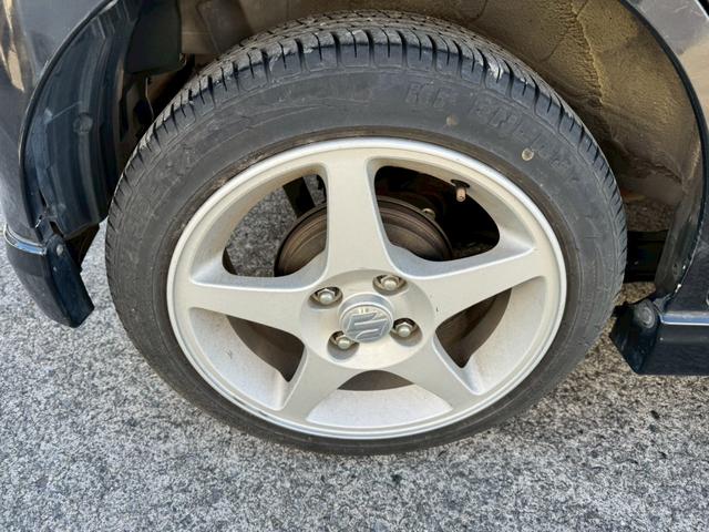 ワゴンＲ ＦＸリミテッド　ナビ／テレビ／ＥＴＣ／スマートプッシュスタート／電格ミラー／レベライザー／パワーウィンドウ／パワーステアリング／シガーソケット／スマートキー／エアバック／純正アルミホイール（46枚目）