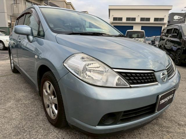 ティーダ １５Ｍ　ナビ　オートエアコン　ハーフレザーシート　キーレスキー　ＥＴＣ　アクセサリーソケット　パワーウィンドウ　パワーステアリング　電動格納ドアミラー　バイザー　１５インチアルミホイール（9枚目）