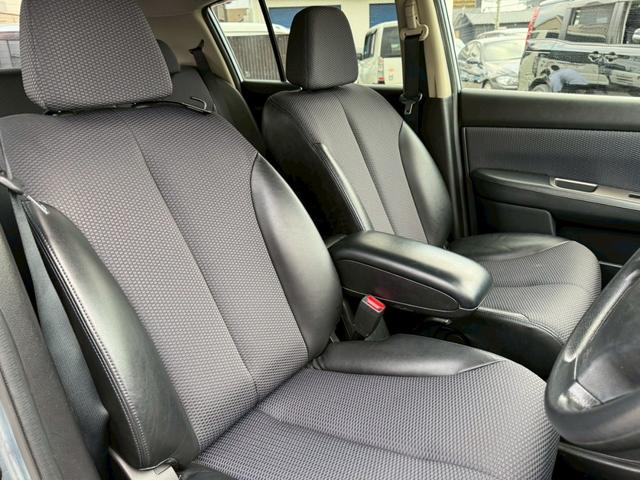 ティーダ １５Ｍ　ナビ　オートエアコン　ハーフレザーシート　キーレスキー　ＥＴＣ　アクセサリーソケット　パワーウィンドウ　パワーステアリング　電動格納ドアミラー　バイザー　１５インチアルミホイール（18枚目）