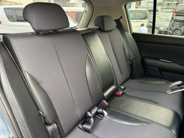 ティーダ １５Ｍ　ナビ　オートエアコン　ハーフレザーシート　キーレスキー　ＥＴＣ　アクセサリーソケット　パワーウィンドウ　パワーステアリング　電動格納ドアミラー　バイザー　１５インチアルミホイール（20枚目）