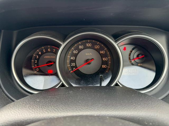 ティーダ １５Ｍ　ナビ　オートエアコン　ハーフレザーシート　キーレスキー　ＥＴＣ　アクセサリーソケット　パワーウィンドウ　パワーステアリング　電動格納ドアミラー　バイザー　１５インチアルミホイール（23枚目）