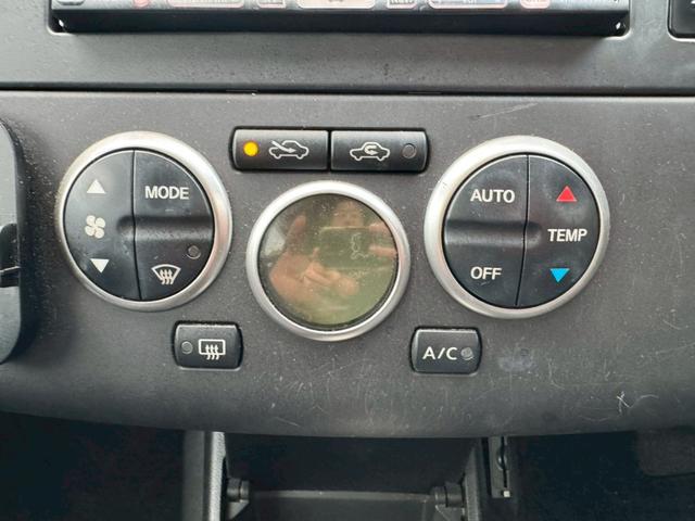 ティーダ １５Ｍ　ナビ　オートエアコン　ハーフレザーシート　キーレスキー　ＥＴＣ　アクセサリーソケット　パワーウィンドウ　パワーステアリング　電動格納ドアミラー　バイザー　１５インチアルミホイール（29枚目）