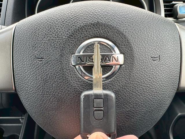 ティーダ １５Ｍ　ナビ　オートエアコン　ハーフレザーシート　キーレスキー　ＥＴＣ　アクセサリーソケット　パワーウィンドウ　パワーステアリング　電動格納ドアミラー　バイザー　１５インチアルミホイール（31枚目）