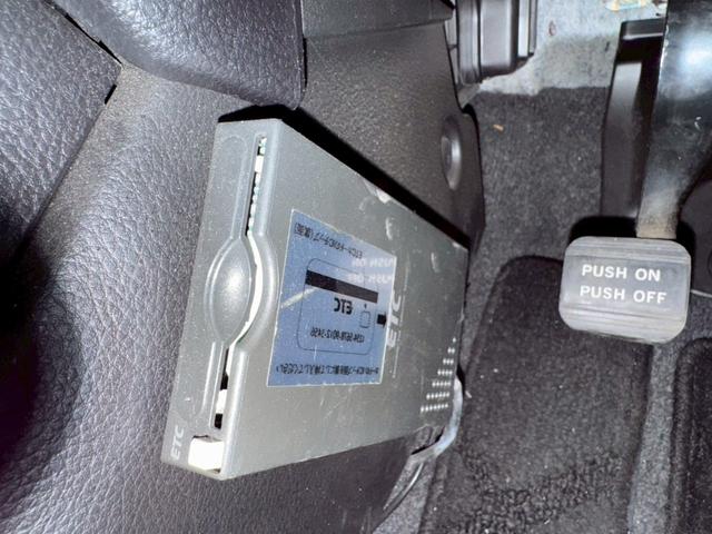 ティーダ １５Ｍ　ナビ　オートエアコン　ハーフレザーシート　キーレスキー　ＥＴＣ　アクセサリーソケット　パワーウィンドウ　パワーステアリング　電動格納ドアミラー　バイザー　１５インチアルミホイール（32枚目）