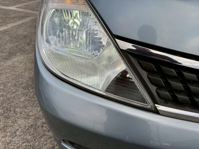 ティーダ １５Ｍ　ナビ　オートエアコン　ハーフレザーシート　キーレスキー　ＥＴＣ　アクセサリーソケット　パワーウィンドウ　パワーステアリング　電動格納ドアミラー　バイザー　１５インチアルミホイール（38枚目）