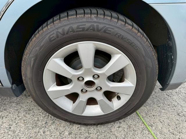 ティーダ １５Ｍ　ナビ　オートエアコン　ハーフレザーシート　キーレスキー　ＥＴＣ　アクセサリーソケット　パワーウィンドウ　パワーステアリング　電動格納ドアミラー　バイザー　１５インチアルミホイール（43枚目）