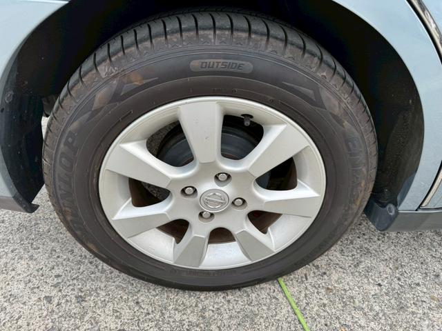 ティーダ １５Ｍ　ナビ　オートエアコン　ハーフレザーシート　キーレスキー　ＥＴＣ　アクセサリーソケット　パワーウィンドウ　パワーステアリング　電動格納ドアミラー　バイザー　１５インチアルミホイール（44枚目）