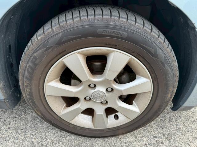 ティーダ １５Ｍ　ナビ　オートエアコン　ハーフレザーシート　キーレスキー　ＥＴＣ　アクセサリーソケット　パワーウィンドウ　パワーステアリング　電動格納ドアミラー　バイザー　１５インチアルミホイール（45枚目）